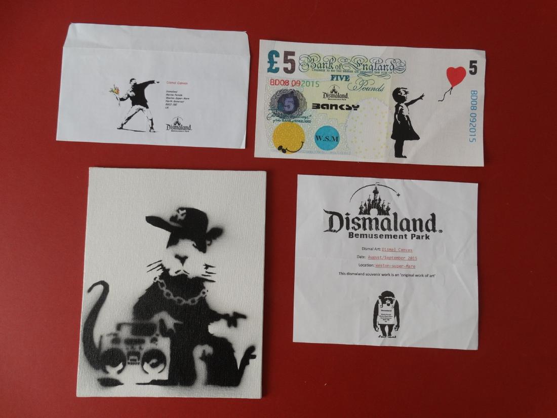 BANKSY: Banksy Dismaland, serigraphy over canvas note(26,5x14cm) and Spray paint (25,5x20,5cm)