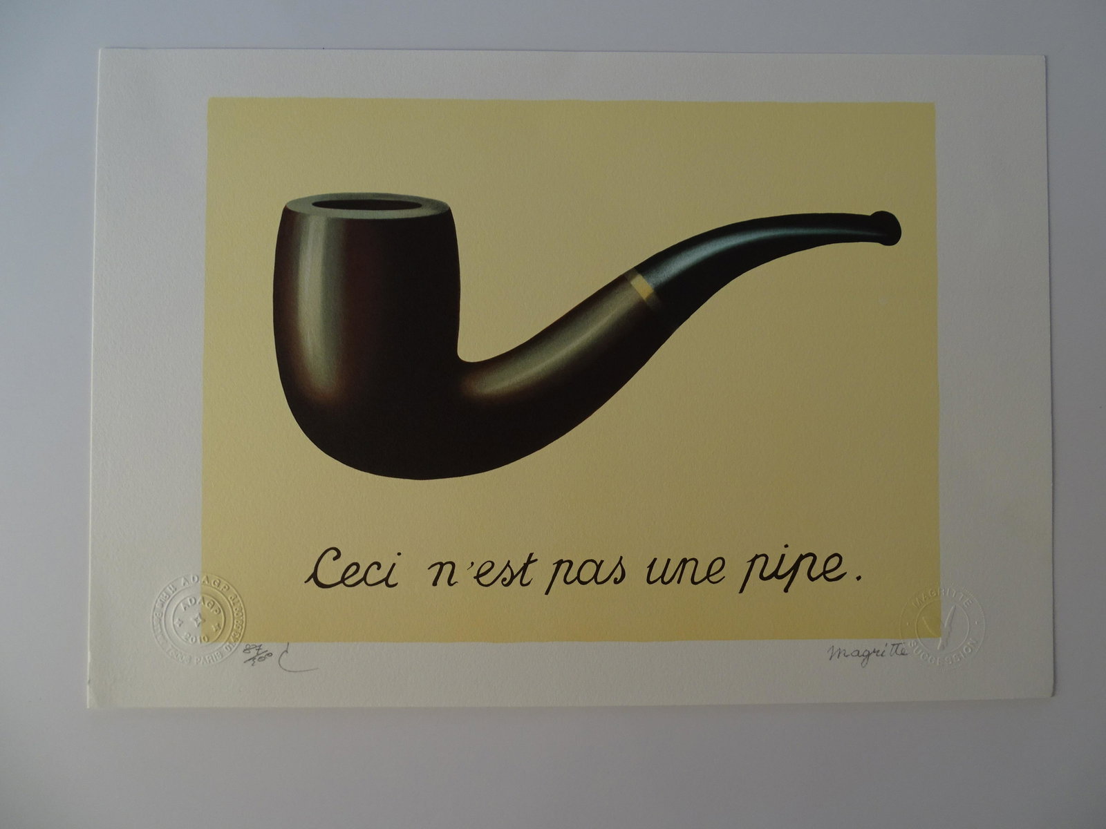 Rene Magritte Composition, COA: Rene Magritte (1898-1967). Lithograph on BFK Rives vellum. Hand signed in pencil by Mr. Charly Herscovici, President of the MAGRITTE Foundation. Numbered / 300 copies, signed in print Lithography made