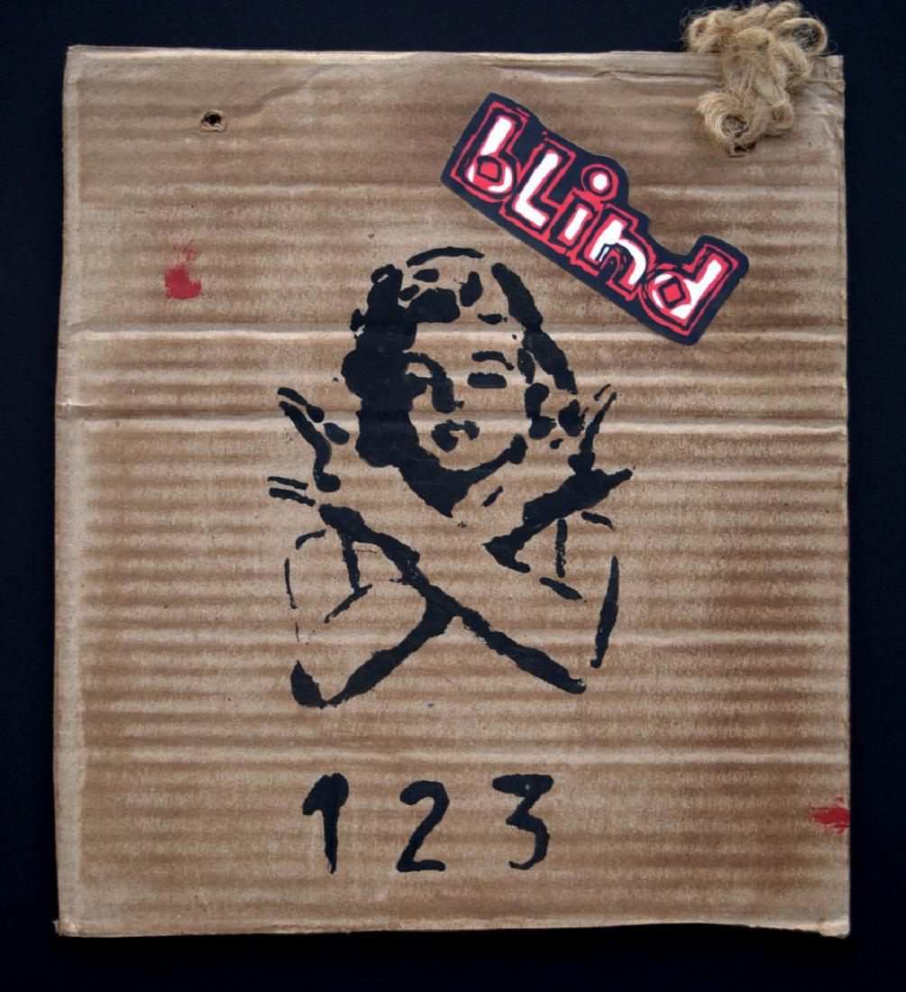 Banksy, Spray Paint Stencil on Cardboard -Marilyn: Banksy, Spray Paint Stencil on Cardboard -Marilyn Monroe Original Dismaland Souvenir, With park entrance.With sticker on the back. With two holes hangingMeasures: 24 x 21,5 cm