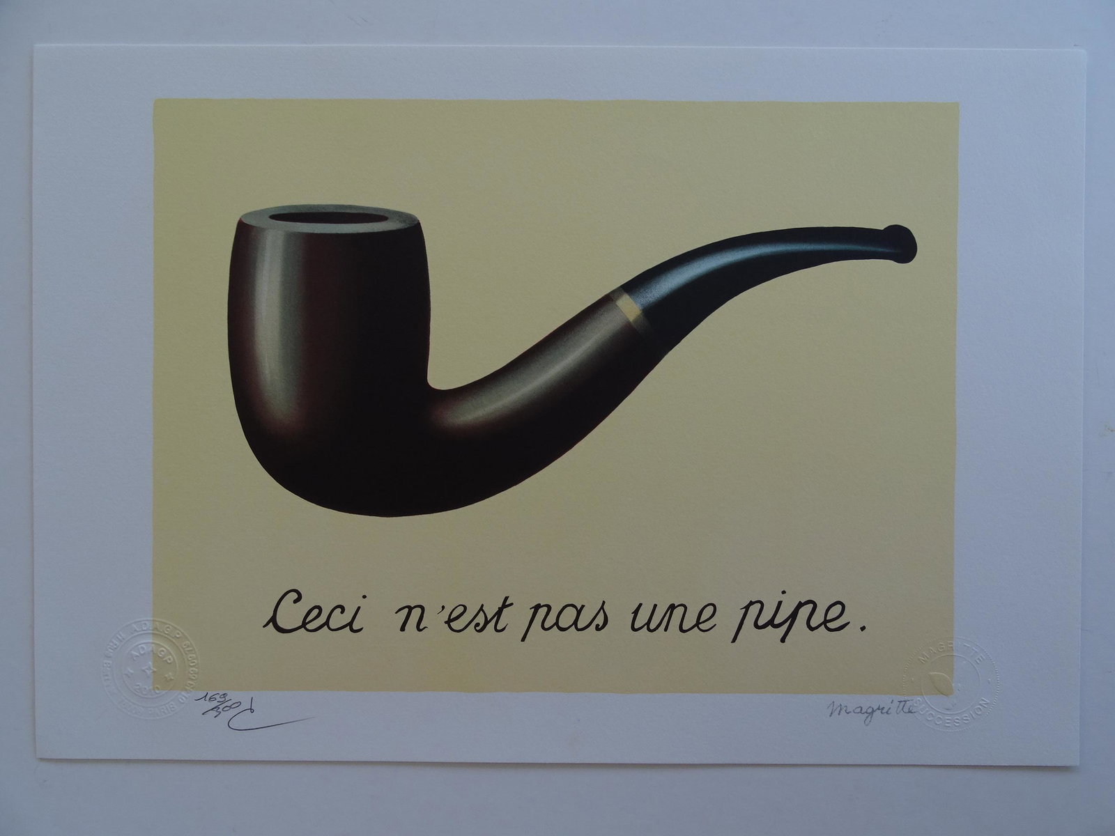 Rene Magritte Composition, COA: Rene Magritte (1898-1967).Lithograph on BFK Rives vellum.Hand signed in pencil by Mr. Charly Herscovici, President of the MAGRITTE Foundation.Numbered / 300 copies, signed in printLithography made und