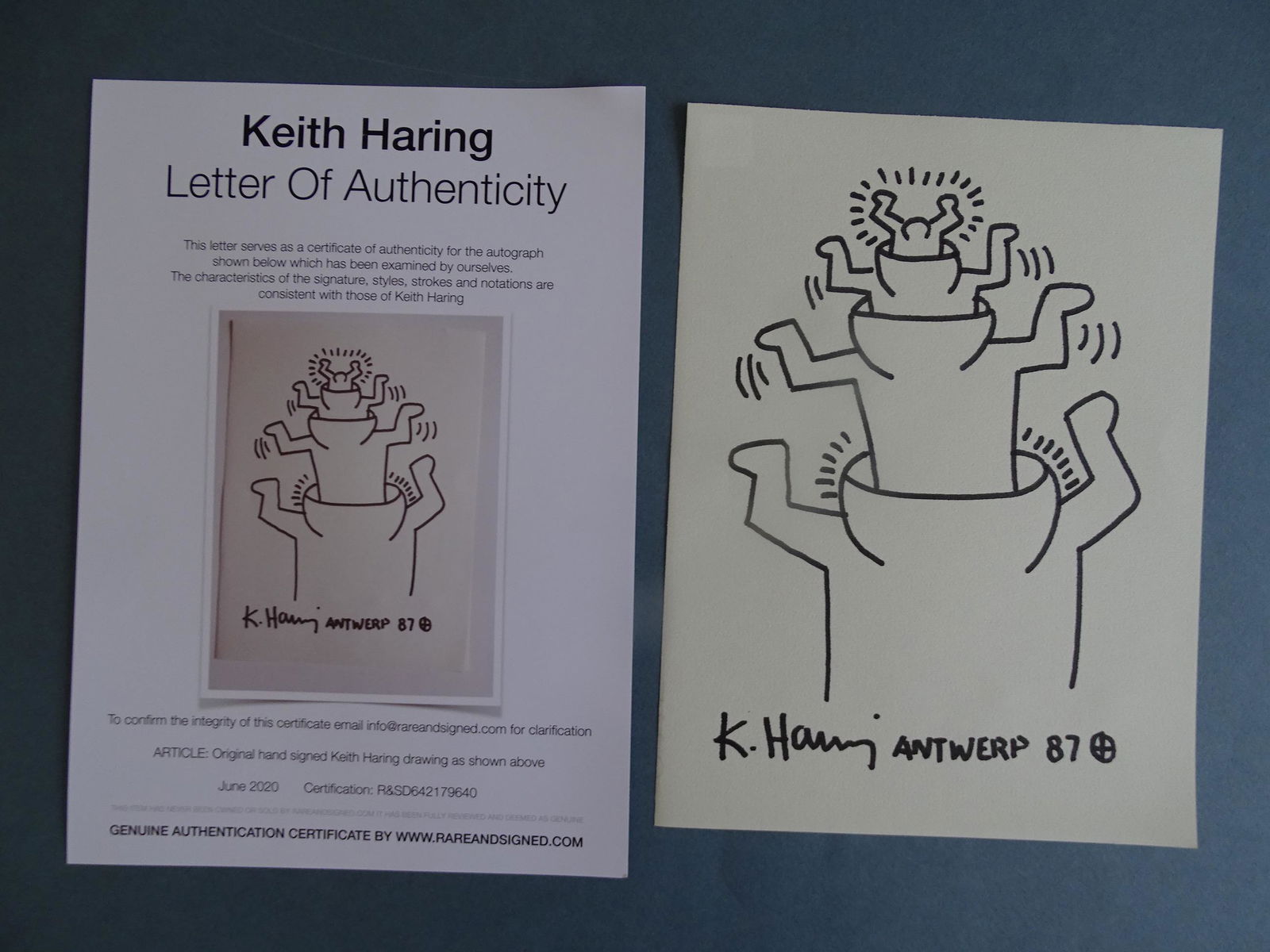 Keith Haring: Keith Haring (attributed), drawing hand signed, paper size:ca 27x20 cm,unframed Haring's work grew to popularity from his spontaneous drawings in New York City subwaysâ€”chalk outlines of figures