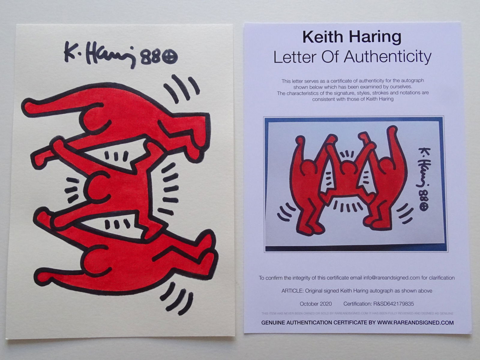Keith Haring: Keith Haring (attributed), drawing hand signed, paper size:ca 30x21 cm,unframed Haring's work grew to popularity from his spontaneous drawings in New York City subwaysâ€”chalk outlines of figures