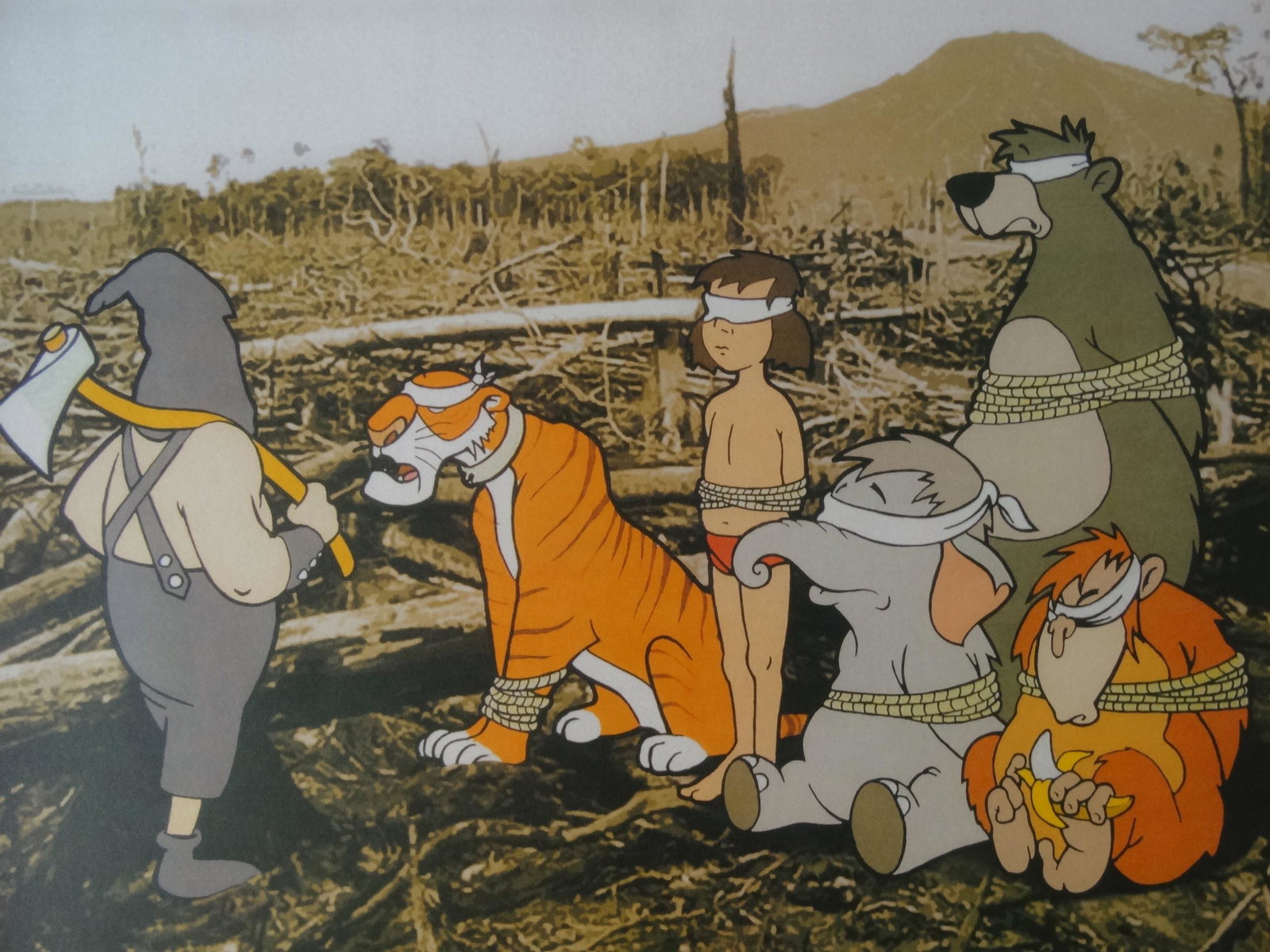 BANKSY: Banksy designed this print for the Greenpeace campaign. The print features some of the main characters from Disneys jungle book transposed onto a picture of a devastated forest . These prints were wit