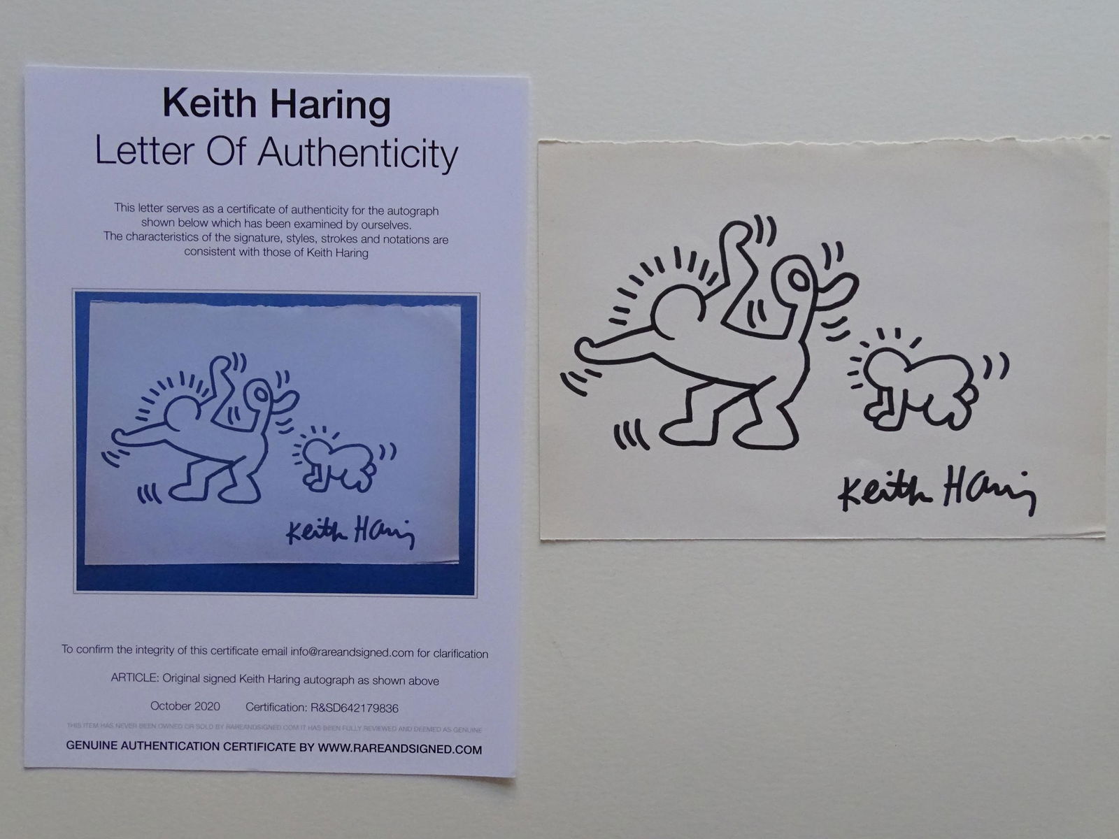 Keith Haring: Keith Haring (attributed), drawing hand signed, paper size:ca 24x16.5 cm,unframed Haring's work grew to popularity from his spontaneous drawings in New York City subwaysâ€”chalk outlines of figur