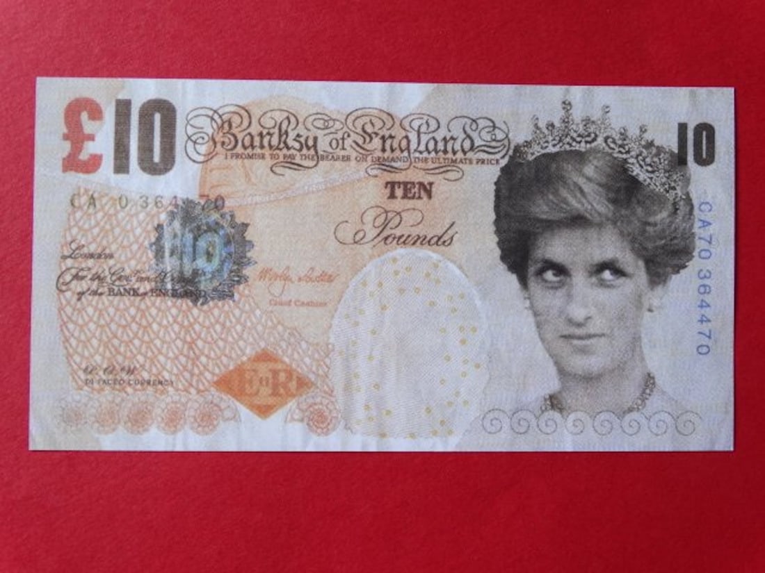 BANKSY: Banksy Di-Faced tenner note (2004) designed by Banksy. About the note the front reads "Banksy of England". DI FACED CURRENCY. "Please note that these notes do not have any of the security features of 