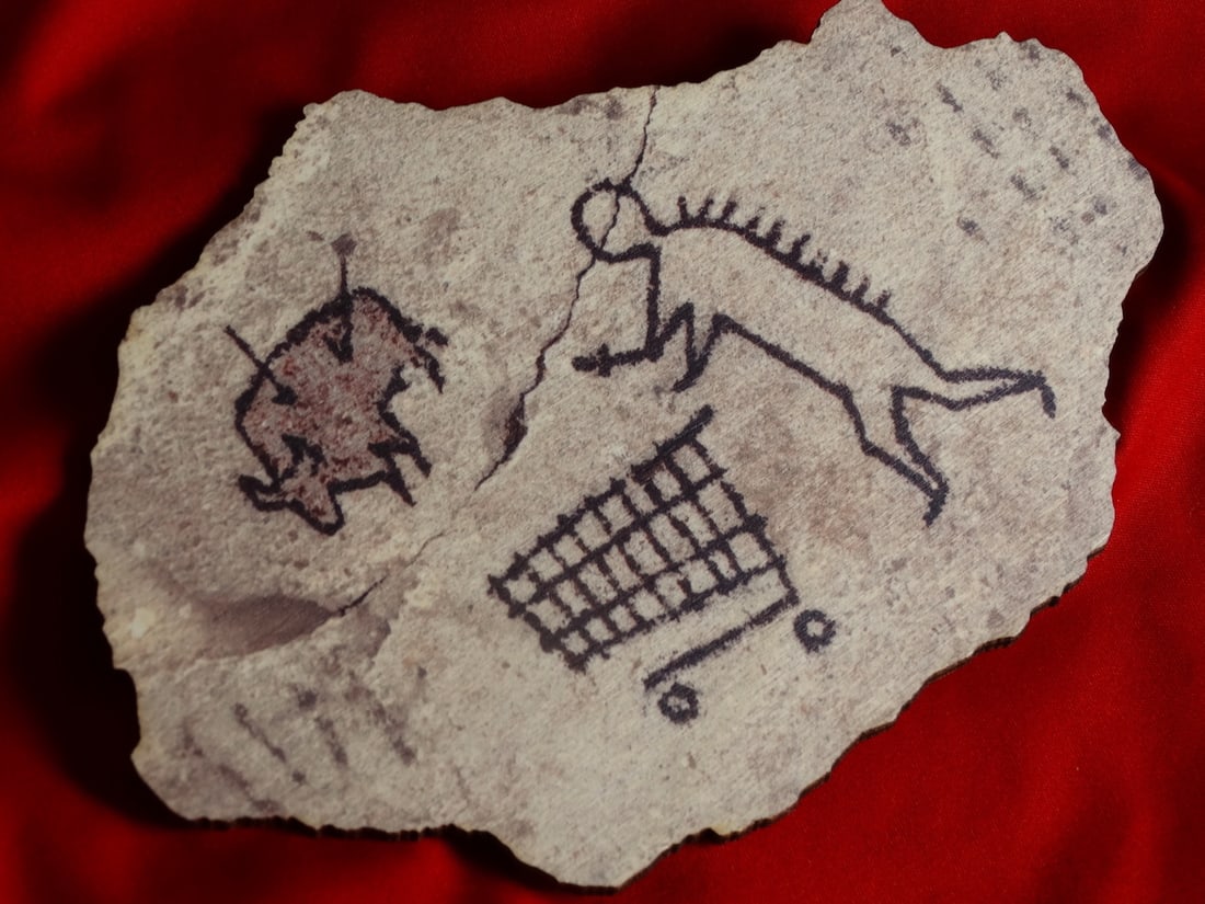 Banksy, wood- Prehistoric shopping: Banksy’s ‘Peckham Rock' is a piece of concrete showing a supposed prehistoric figure pushing a shopping trolley. This was placed in The British Museum in 2005, accompanied by an authentic looking 