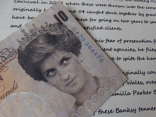 BANKSY: Banksy Di-Faced tenner note (2004) designed by Banksy. About the note the front reads "Banksy of England". DI FACED CURRENCY. "Please note that these notes do not have any of the security features of 