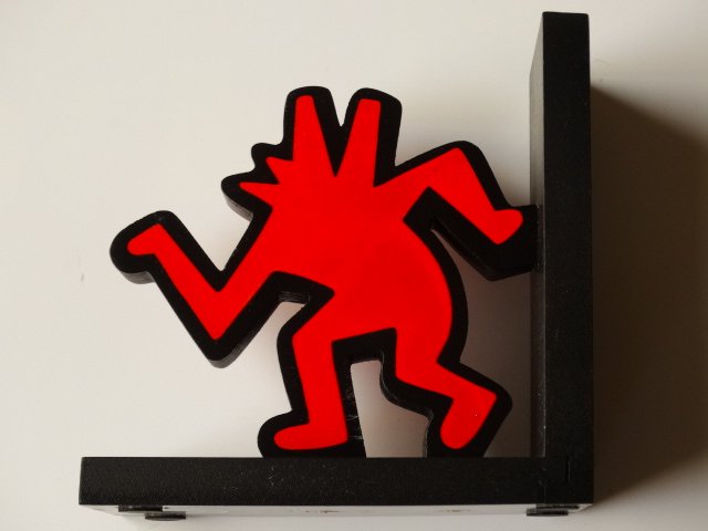 Keith Haring- sculpture-Dancing Dog, 1993: Keith Haring Foundation 1993, wood, ca 15x15cm