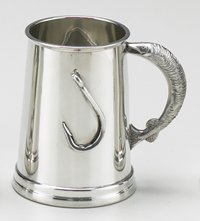 FISH HOOK TANKARD: This solid pewter body tankard comes with a raised fish hook design on the front and is polished off with a fish for a handle. A great gift for any fisherman.
