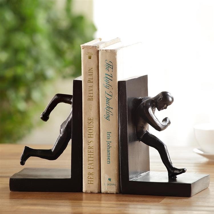 Running Man Bookends: Running Man Bookends - Dimensions: 7"H 4.5"W 4.5"D Material: Resin Weight: 5.25lbs