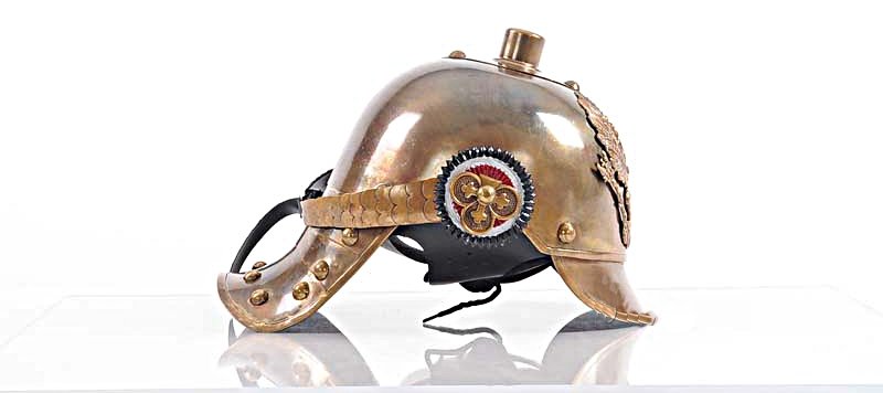 German Helmet: Dimension: L: 12.5 W: 9 H: 8 Inches AboutThis German Helmet is known as the Prussian Model 1915 Artillery Pickelhaube. The Model 1915 helmet replaced the brass and German silver fittings with steel to