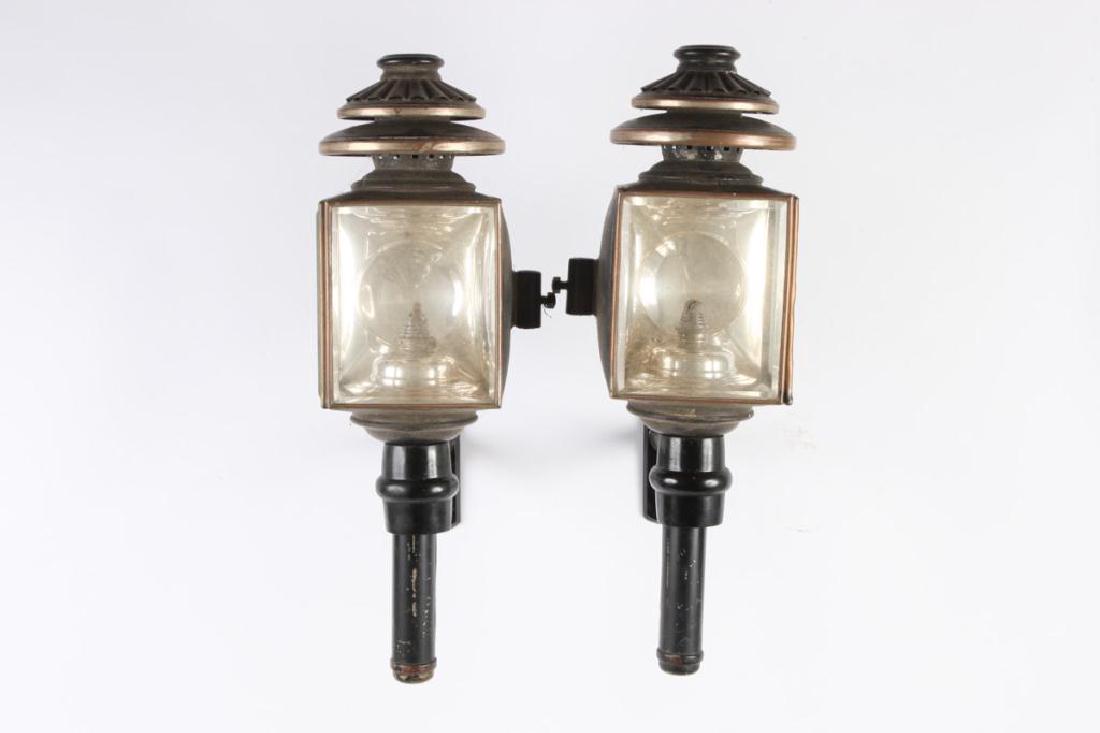 PAIR OF CARRIAGE LAMPS by CUNNINGHAM: Height 22 inches.