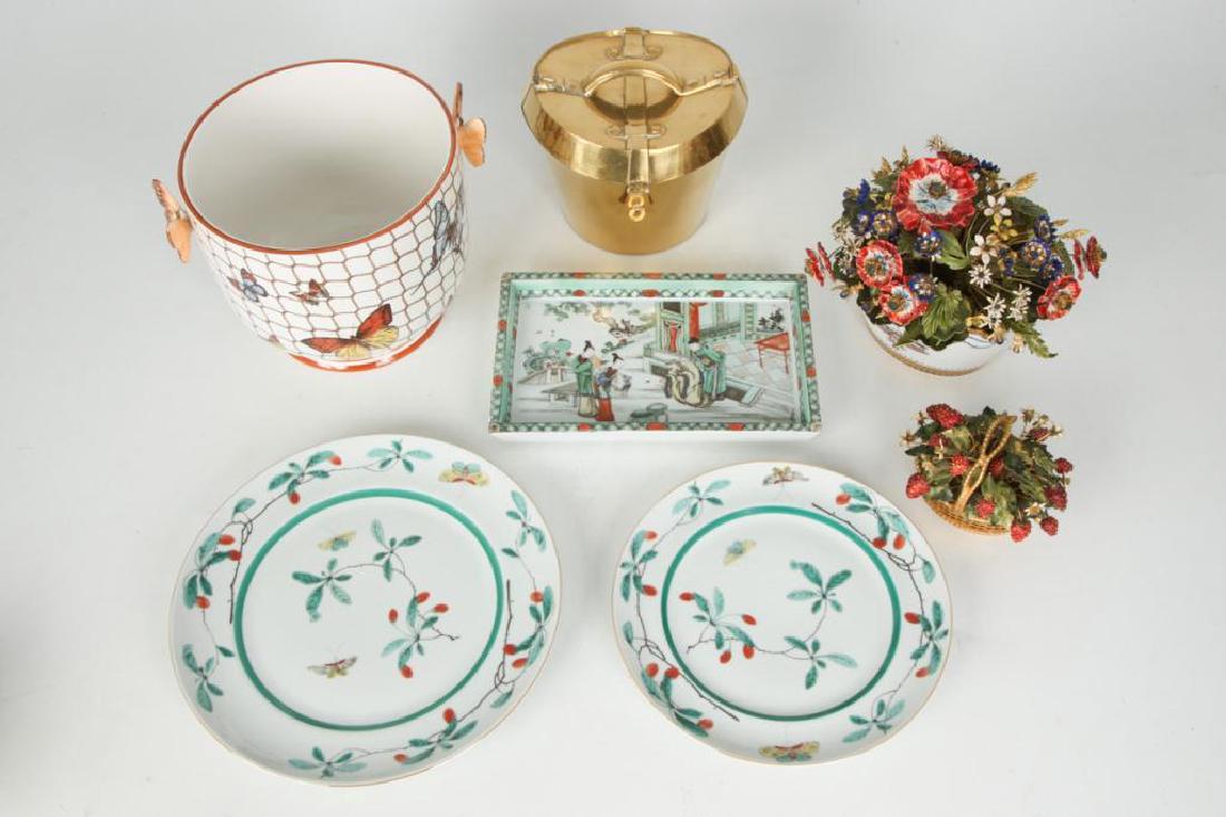 GROUP OF MOTTAHEDEH LUXURY HOME DECOR WARES: Including: Brass hatbox form container, Kang Hsi pin tray, large basket of enamel flowers, Italian wine cooler decorated with butterflies and (2) plates. Together with a second unmarked basket of enam
