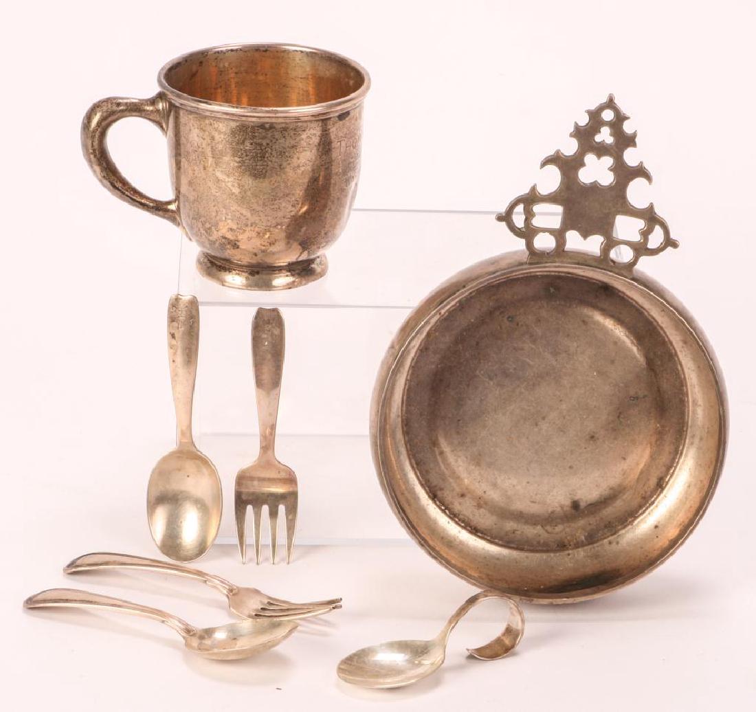 (7) PIECES OF CHILDREN'S STERLING SILVER: Including: Reed and Barton John Coney reproduction porringer, Shreve & Co. cup, (2) forks and (3) spoons. 17.27 troy ounces. "Thomas Holcomb 1954" engraved on cup.