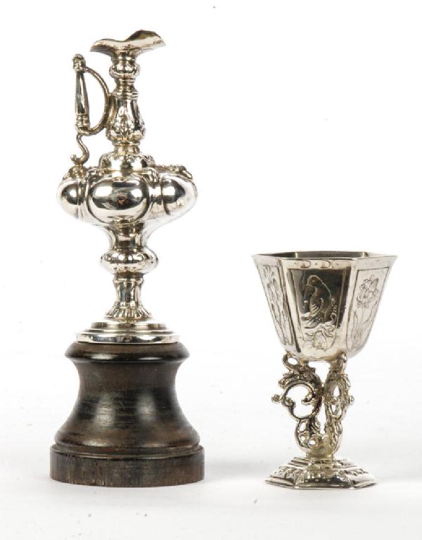 MINIATURE STERLING SILVER CHALICE AND EWER: Marked sterling. 1.47 troy ounces (not including base) 4 and 2 inches (height)