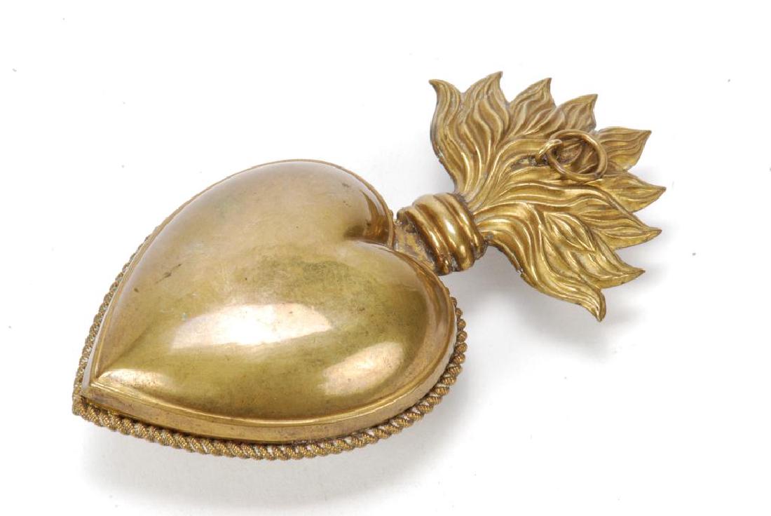 FRENCH EX VOTO RELIQURY FLAMING HEART LOCKET: Brass with gold wash interior. Height 5 inches. Engraved with "M" (Mary)