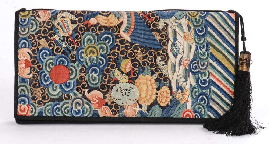 ASIAN PURSE WITH CARVED WHITE JADE APPLIQUE: Stitched with scene of bird, flowers, sky and water. Mirror and envelope purse inside fitted interior. 5 x 10 inches. Jade measures 1 x 1 1/4 inches.