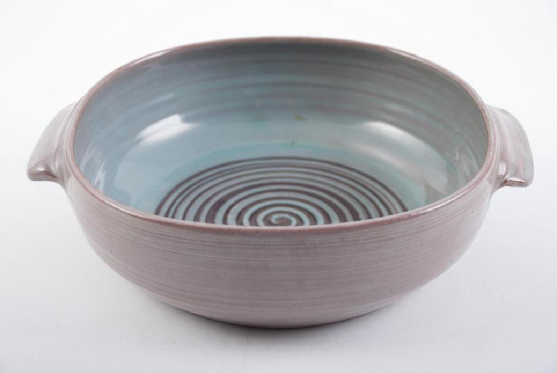 EDWIN AND MARY SCHEIER CASSEROLE BOWL: Redware with milky, green and tooled brown glazes. Applied handles. 11 inches (diameter at largest point)