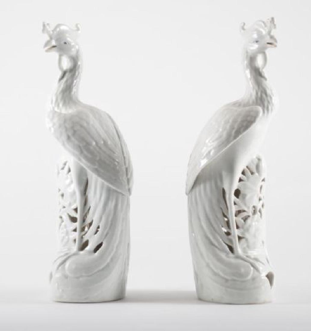 GROUP OF PORCELAIN: Including a pair of Yu Sang Sing Zuo Blanc de Chine Porcelain Pheasants, mid-20th century; impressed “China” with four character seal; height: 12 in.; with a Meissen Porcelain Golden Oriole, c. 19