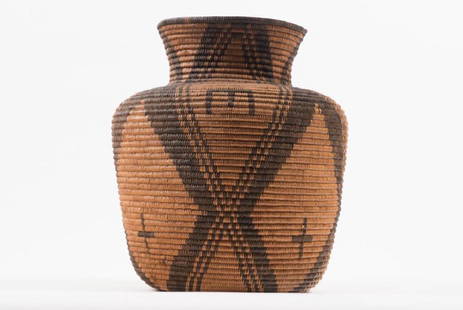 NATIVE AMERICAN INDIAN BASKET: Probably Apache. Coil construction with alternating colored twine. Height 12 inches. It is well documented that Andy showered Jon Gould with gifts during their entire relationship. This sale