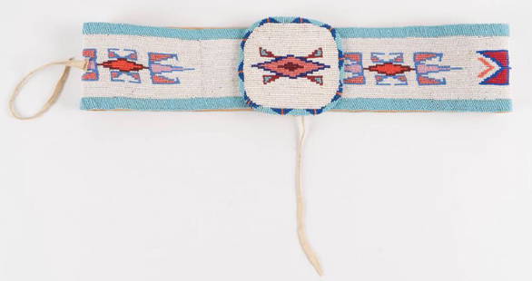 BEADED AMERICAN INDIAN BELT: (3) Tabs, canvas backed. Length 35 inches. It is well documented that Andy showered Jon Gould with gifts during their entire relationship. This sale includes a great quantity of these items which