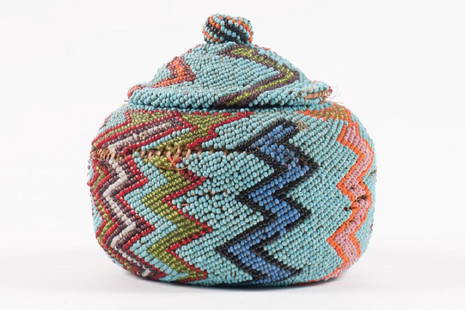 NATIVE AMERICAN BEADED BASKET with LID: Probably Navajo. 4 1/2 x 4 1/2 inches. It is well documented that Andy showered Jon Gould with gifts during their entire relationship. This sale includes a great quantity of these items which Jon