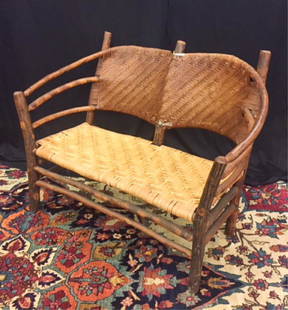 ADIRONDACK RUSTIC SETTEE POSSIBLY "OLD HICKORY": Steam bent natural wood. Split ash back and seat. 38 x 47 1/2 x 21 inches It is well documented that Andy showered Jon Gould with gifts during their entire relationship. This sale includes a great