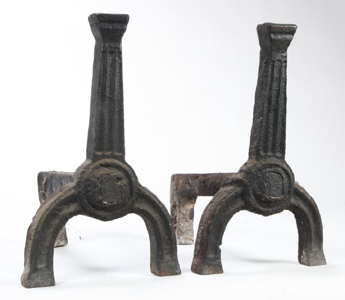 (17th c or Earlier) PUDDLE CAST ANDIRONS: Fluted columns with expanded top knob and arched molded legs, very heavy. 15 x 9 x 14 inches.