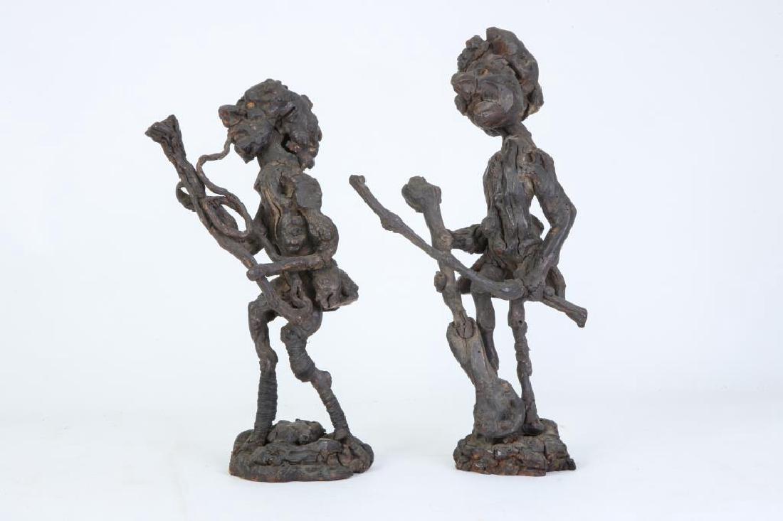 (2) CARVED BURLED ROOT WOOD FIGURES: (19th c) Folk art including: "Man with Rifle" and "Musician". Each carved and assembled. height 12 x 10 1/2 inches.