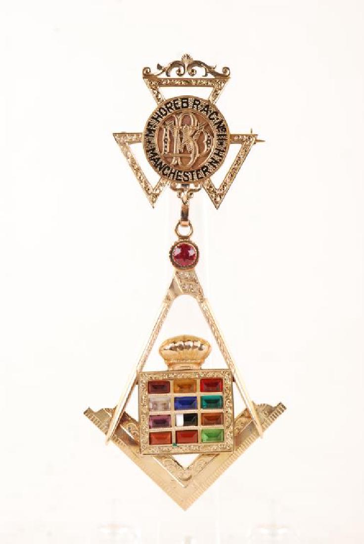 14K GOLD MASONIC "HOREB RAC NO 11" JEWEL 1935: Manchester, NH. Designed with an array of Masonic imagery and inlayed with round and emerald cup semiprecious stone. Engraved verso "1935 Mount Horeb R.A. Chapter No. 11 to Ex. Comp Don W. Blair". len
