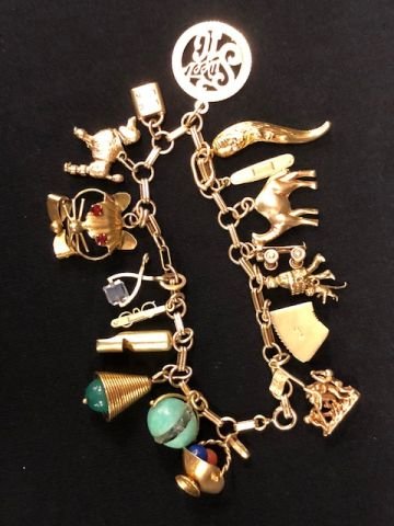 INTERESTING 18K and 14K GOLD CHARM BRACELET (1 of 7)