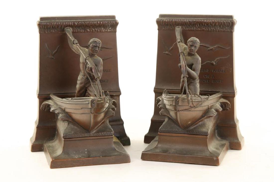 "MOBY DICK" BOOKENDS: "A Dead Whale or a Stove Boat" bronzed zinc alloy. 7 x 5 x 4 inches.