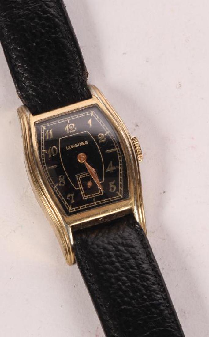 LONGINES GOLD PLATED TANK WRIST WATCH "Bulova quality",: "Bulova quality", stunning black dial with second hand. serial number 8981320.