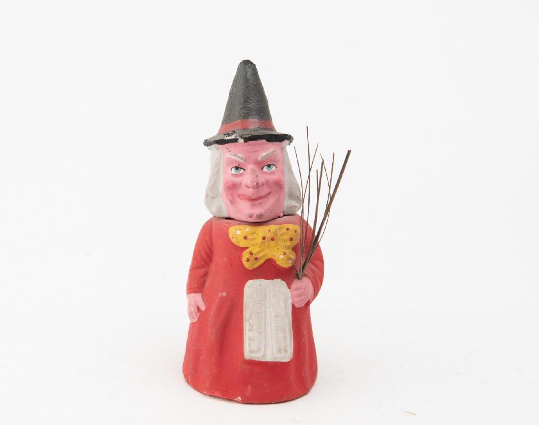 C. 1920s GERMAN COMPOSITION WITCH CANDY CONATINER: Marked "Germany" on bottom. 6 3/8 x 2 1/2 x 2 3/4 inches