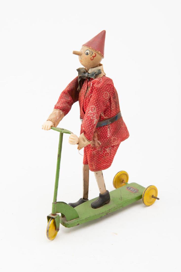 BREVETTATO ITALIAN TIN TOY PINOCCHIO ON SCOOTER (1 of 5)