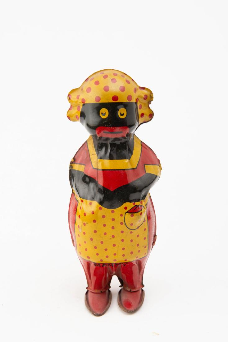 C. 1930s LINDSTROM MAMMY SHAKO WALKER WIND-UP: "MAMMY" on front and "Lindstrom / Made in USA / Pat. Applied For". 8 x 3 x 3 inches