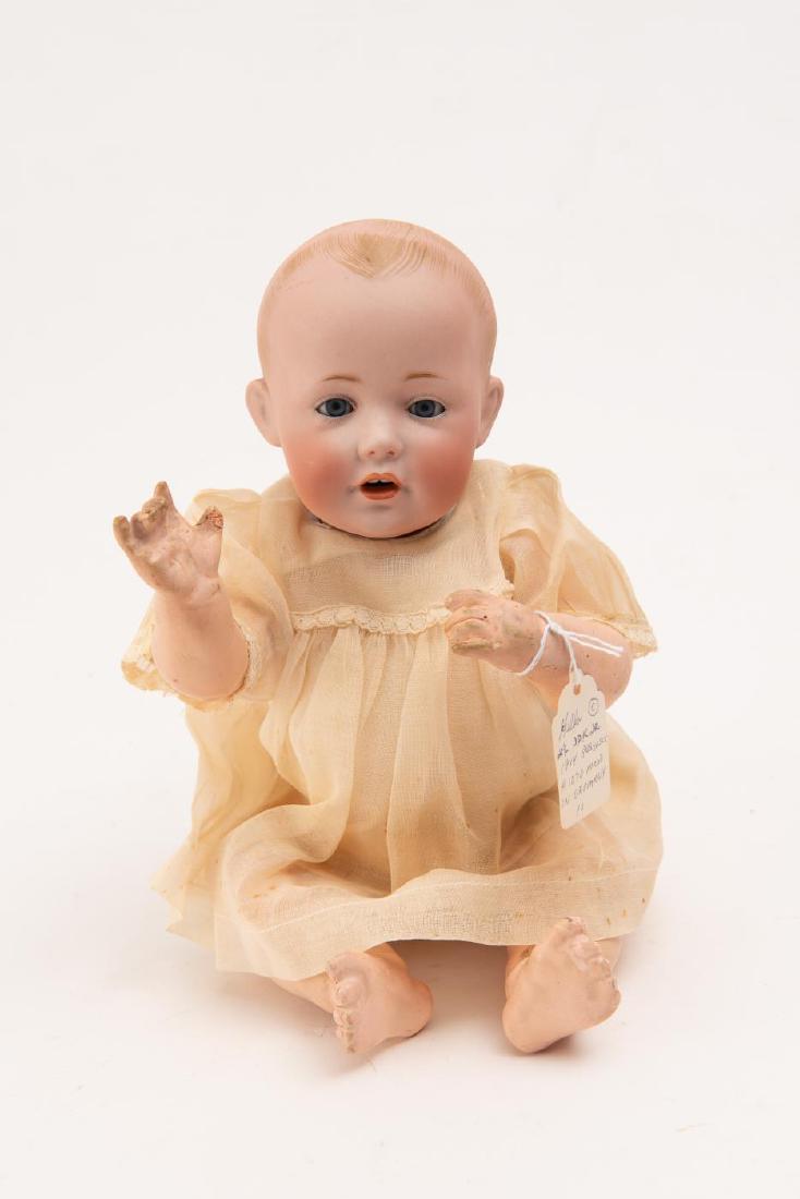GES GESCH 1914 "HILDA" DOLL MADE IN GERMANY: #1070. Closing glass eyes, stationary teeth. Origianal clothes. 3 1/2 inch (head). 13 inches (overall)