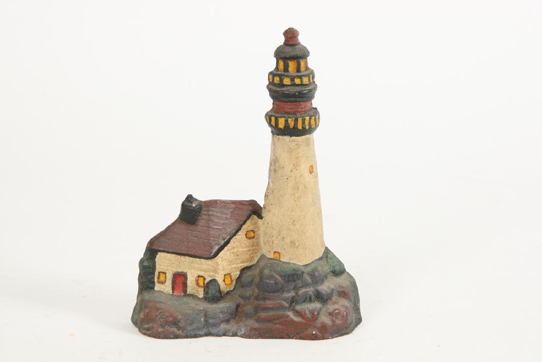 CAST IRON LIGHTHOUSE DOORSTOP (1 of 3)