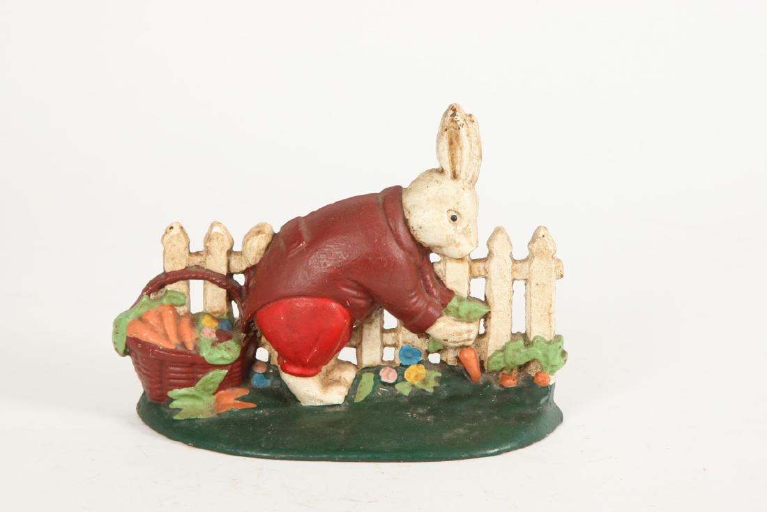 NEW ENGLAND CAST IRON RABBIT IN GARDEN: Doorstop. Unmarked. 6 inches