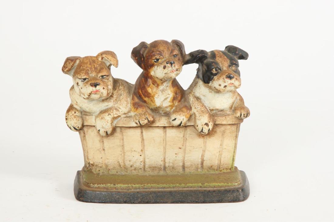 1932 ROSENSTEIN CAST IRON PUPPY DOORSTOP: (3) Bathing Puppies. Signed. 7 inches.