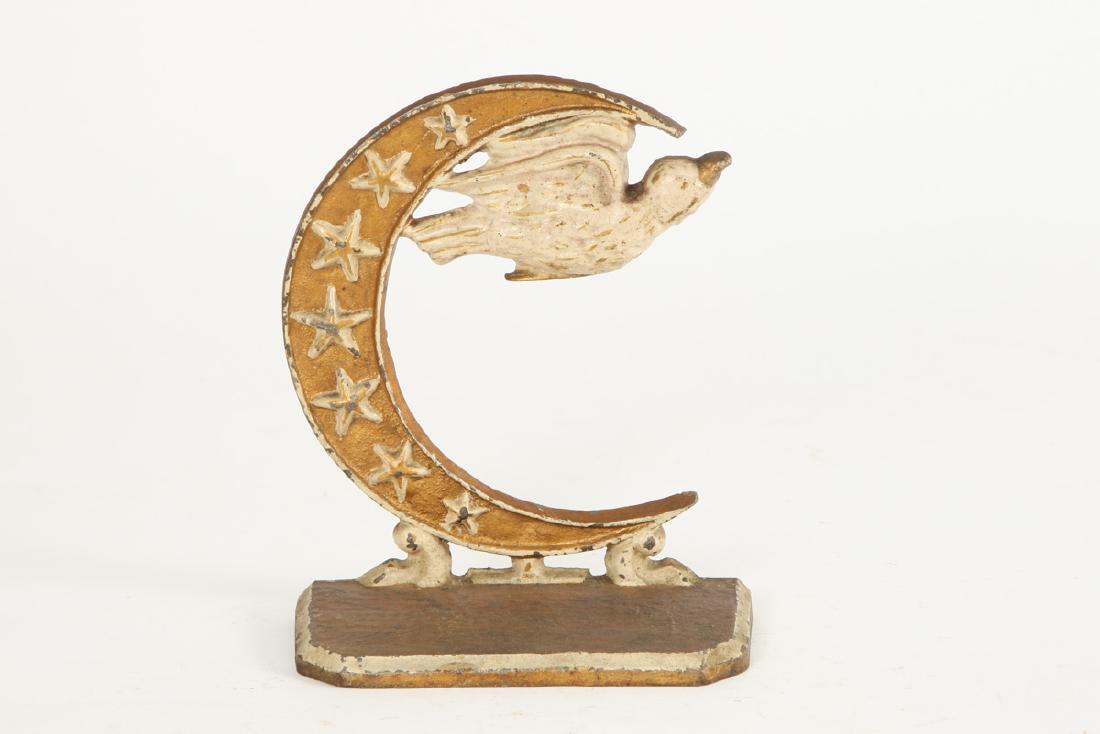CAST IRON BIRD OVER CRESENT BOOKEND (1 of 3)