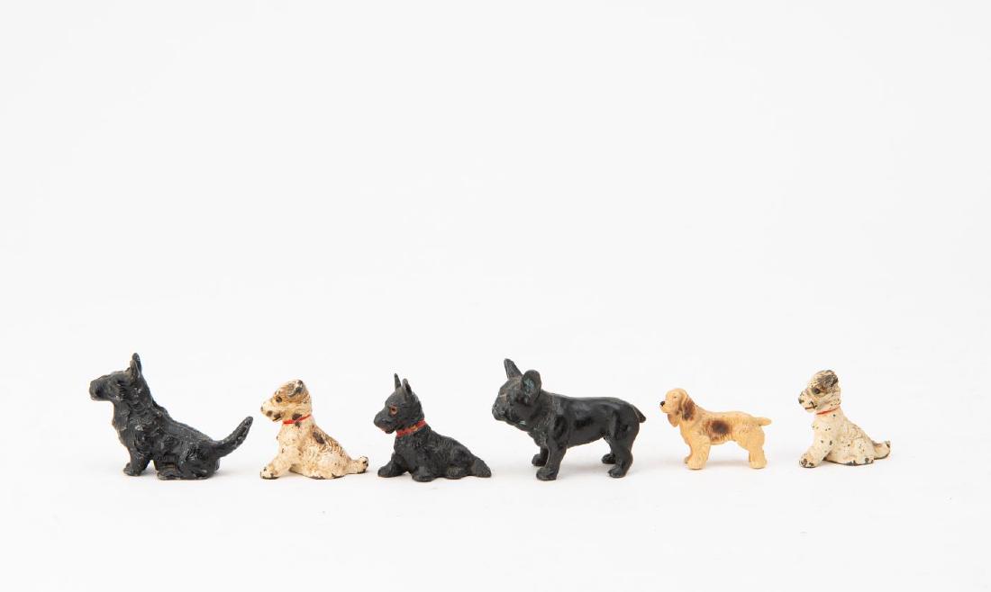 SIX PAINTED CAST IRON PAINTED SMALL DOGS (1 of 5)