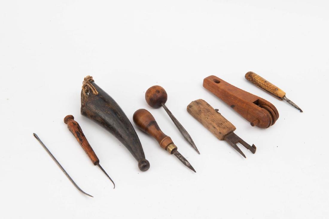 ASSORTMENT OF SAILORS TOOLS (8): Including a wood pulley, a bone handled cross-hatched decorated hook, and a carved horn needle holder. 6 1/2 inches