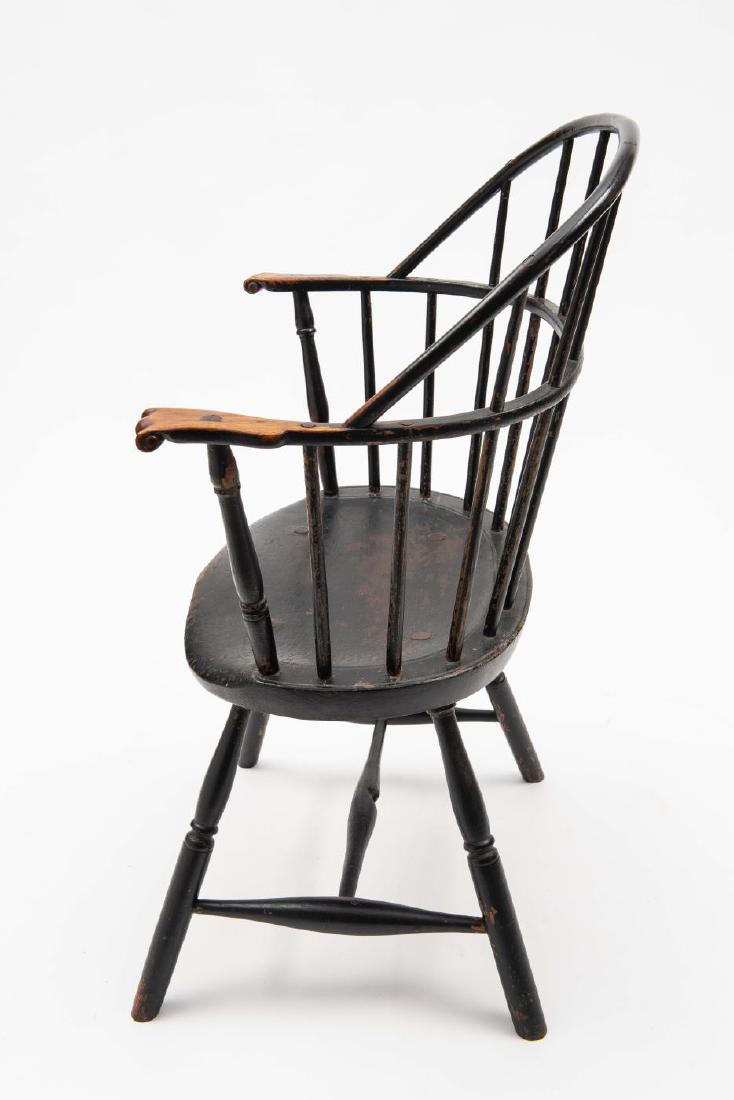 SACK BACK KNUCKLE ARM WINDSOR ARMCHAIR: In old paint. 35 1/2 x 26 x 18 1/2 inches.