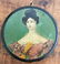 ROUND LACQUER BOX WITH LADY WITH PEARLS