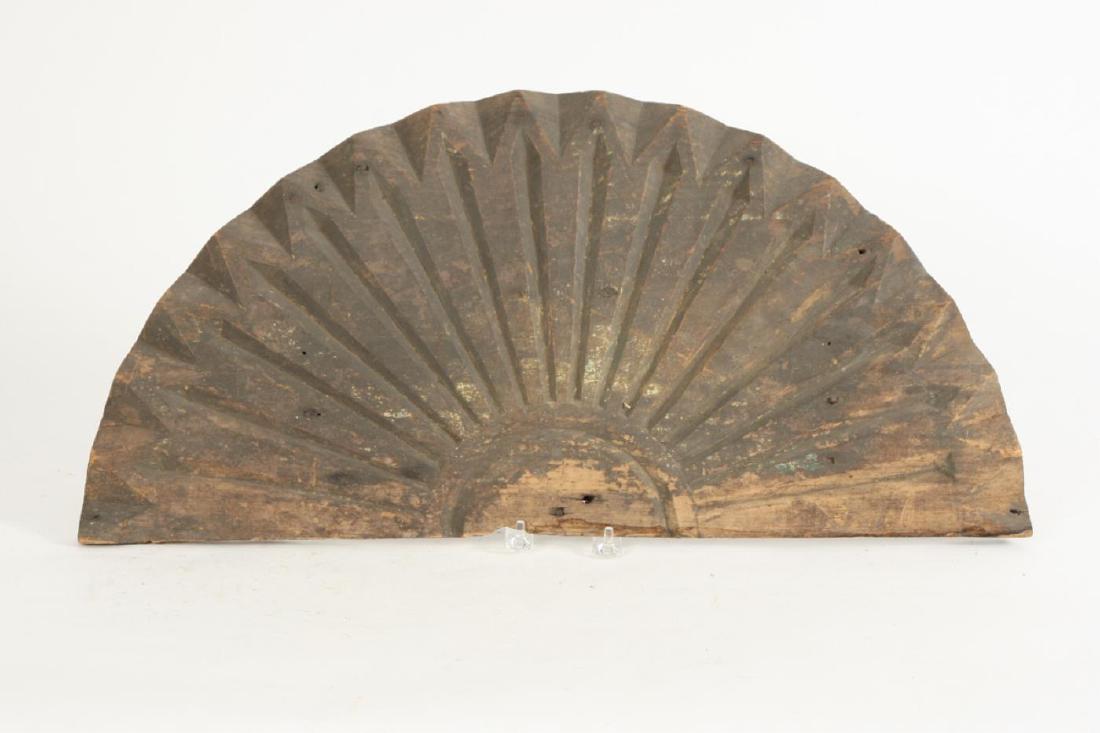 EXTERIOR ARCHITECTURAL CARVED WOOD SUNBURST: 19TH c, In dry, worn grey brown surface paint. 12" x 24"