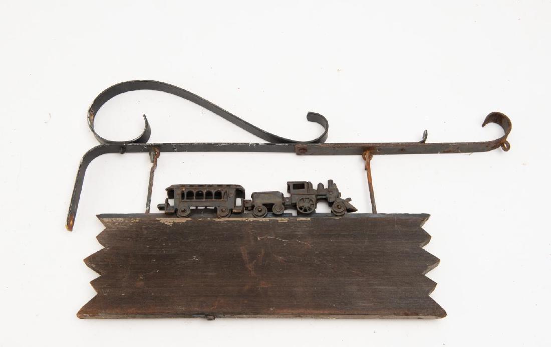 BRACKETED SIGN INCORPORATING A TOY TRAIN (1 of 3)