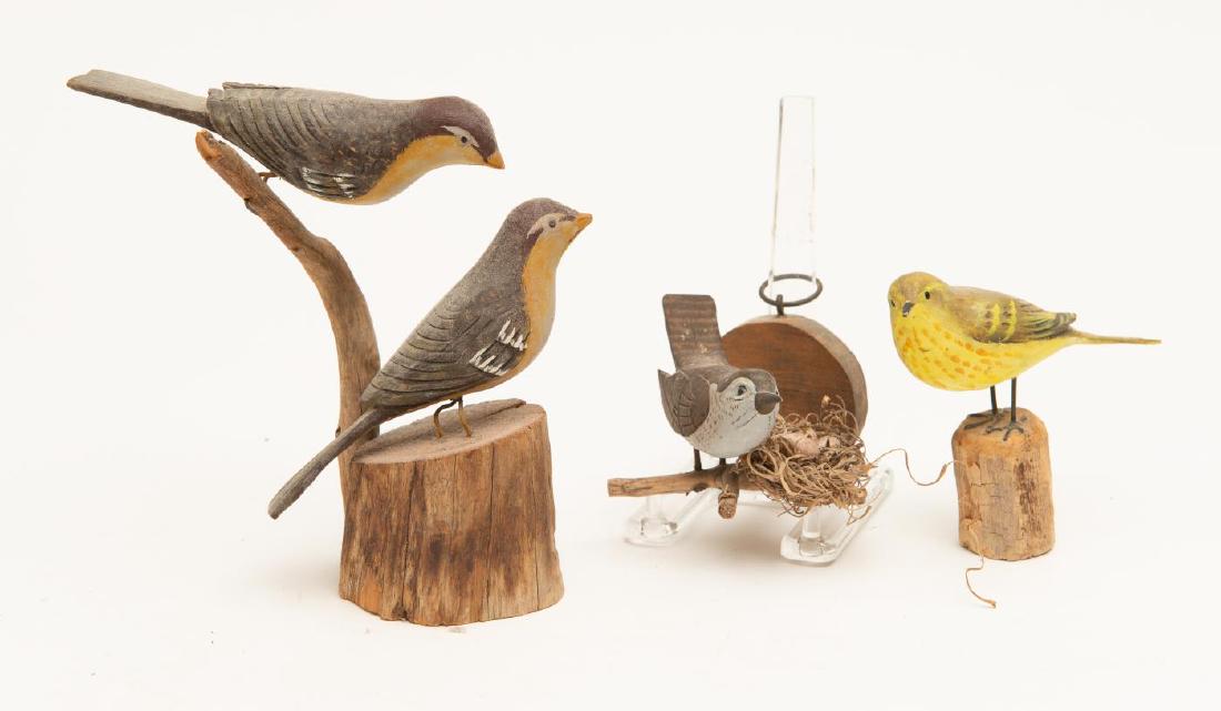FOUR CARVED AND PAINTED SONGBIRDS ON STANDS (1 of 3)