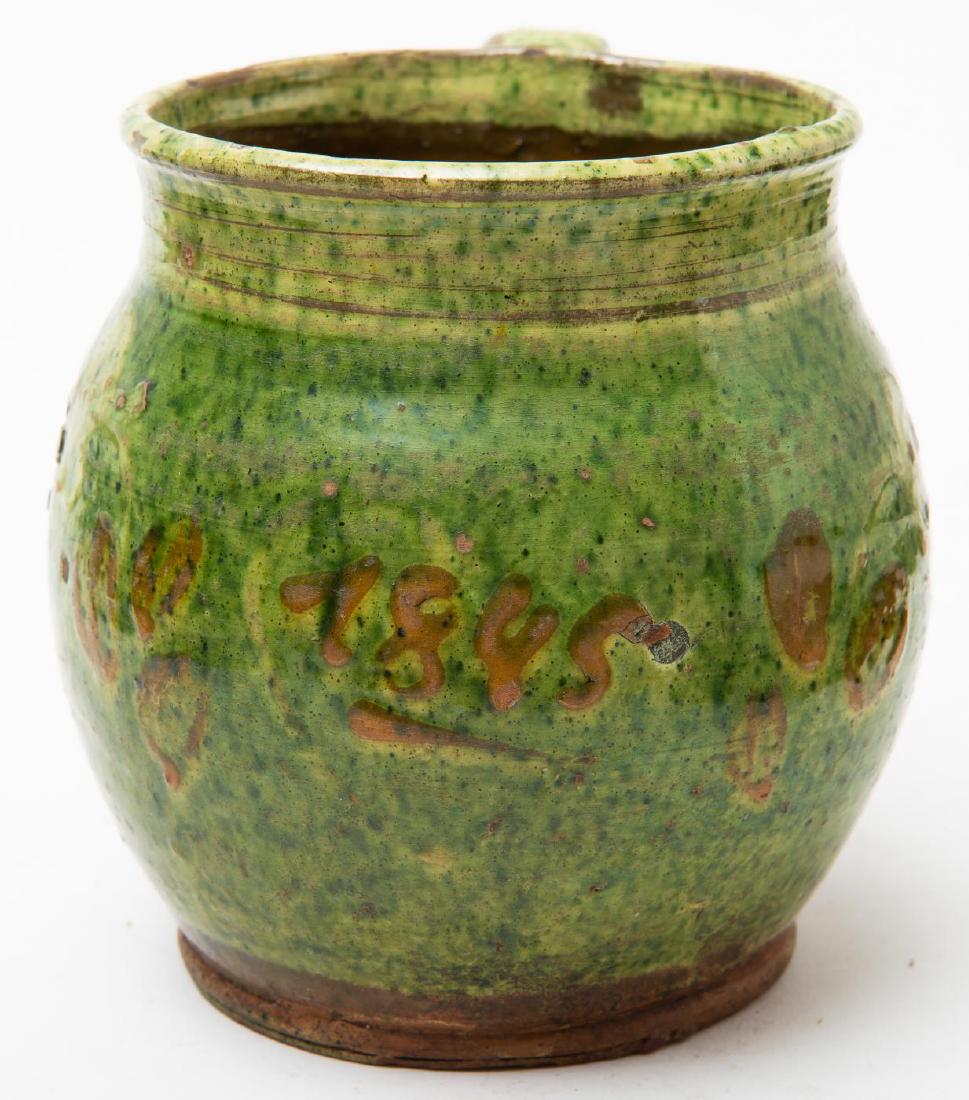 DATED REDWARE WIDE MOUTH JUG in GREEN GLAZE: "1835" Green with darker green speckle glazes. 5 inches.