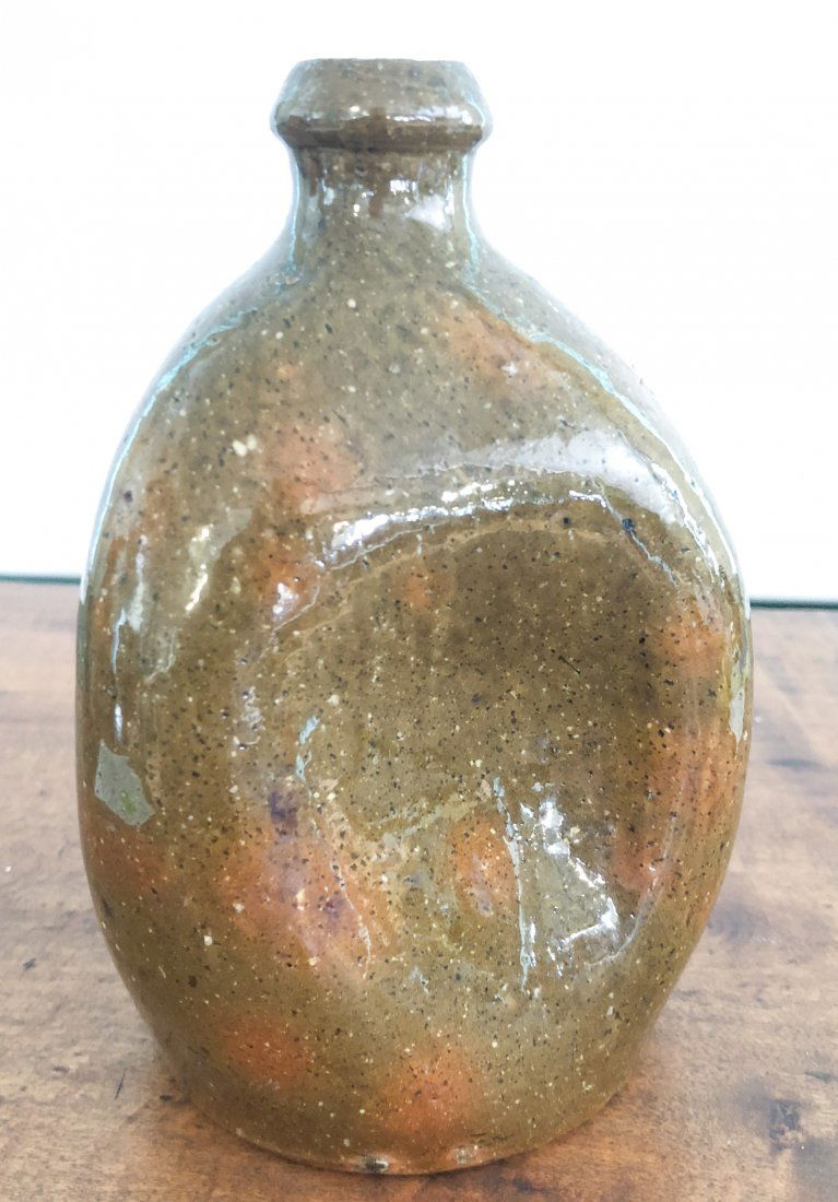 1148SMALL REDWARE JUG with INTERESTING GLAZE (1 of 4)